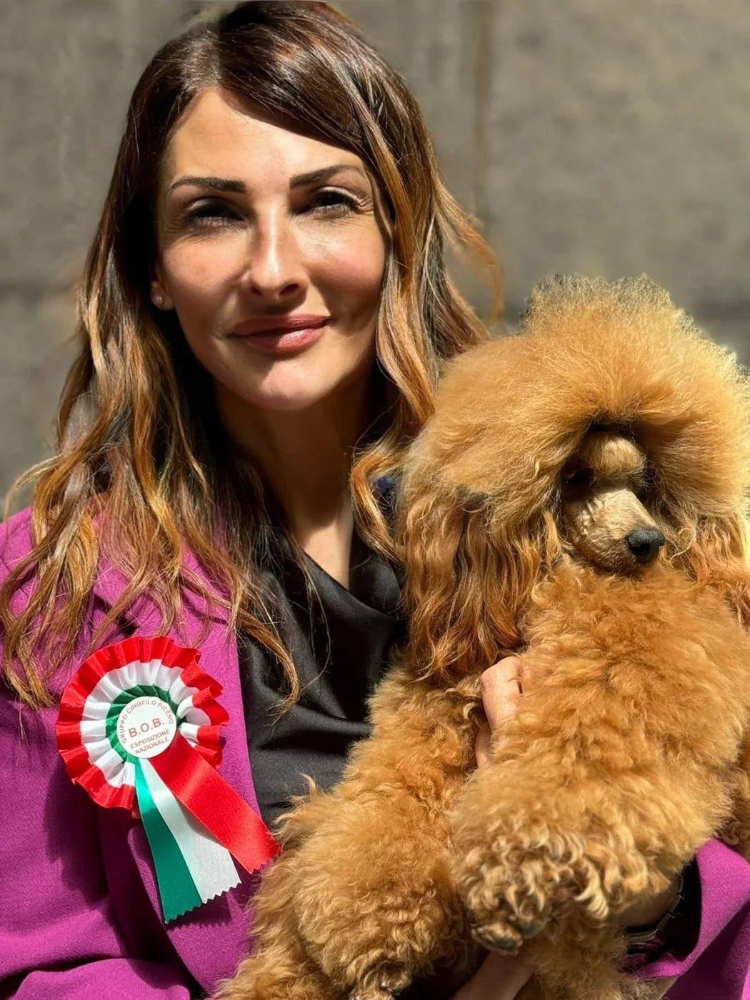 Owner with award-winning poodle